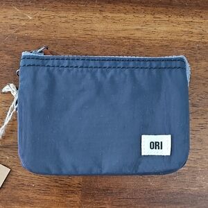 Gray Wallet with Zipper Closure and Textured Fabric